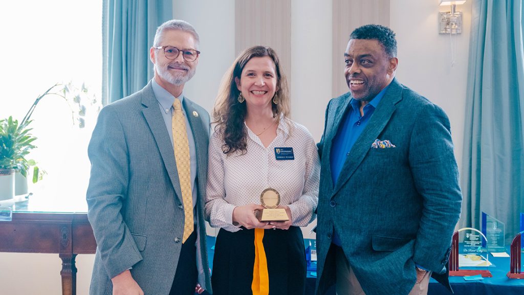 Dr. Kimberly Petersen accepts the Excellence in Teaching Award