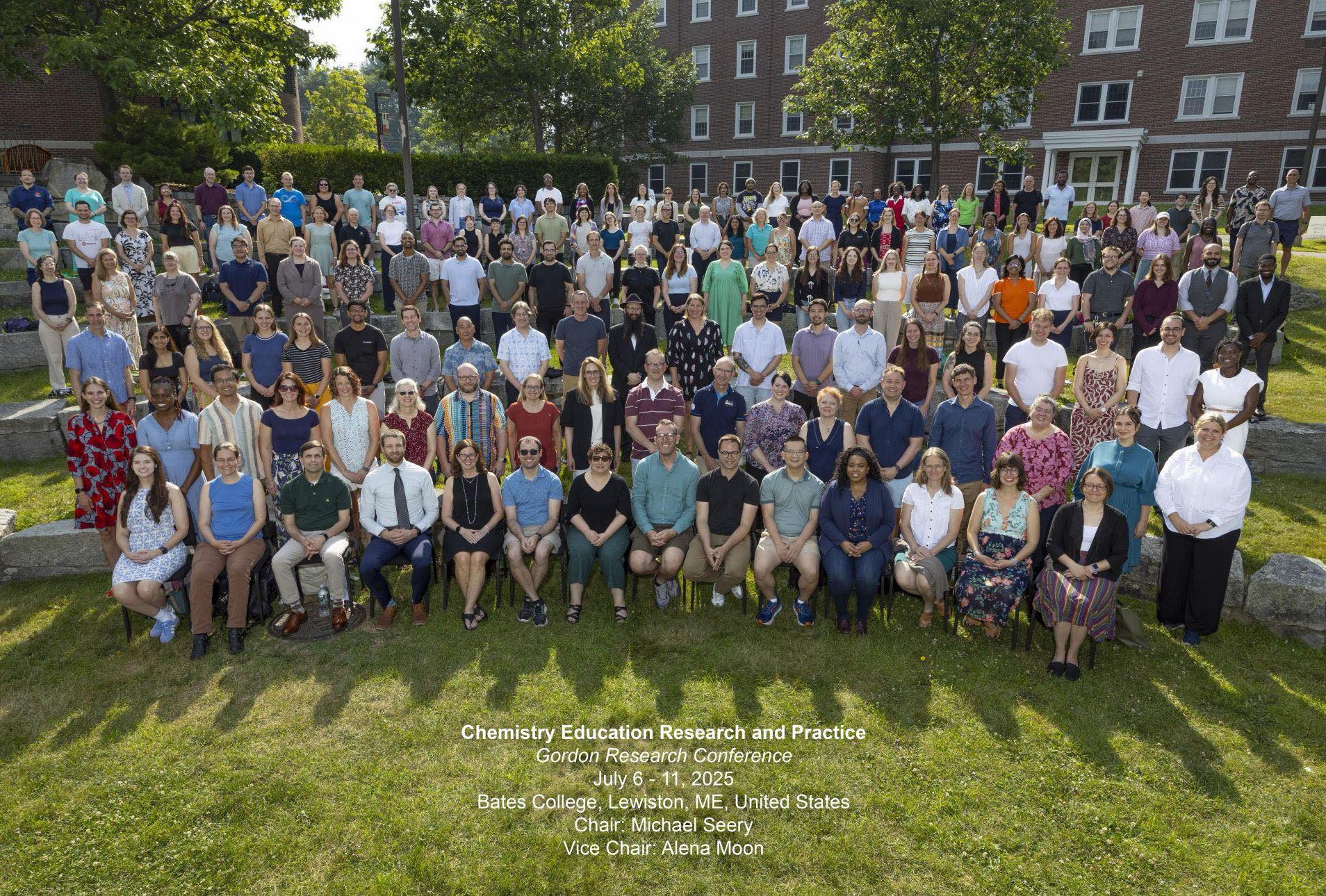 Approximatelly 150 attendees of the GRC conference posing on stone stairs for a photo
